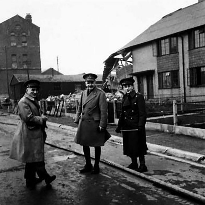Major General Packenham Walshe and Colonel Guiness view damage caused by the Belfast Blitz in April 1941